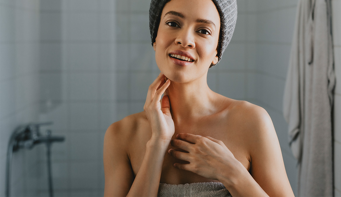 patting skin dry with towel