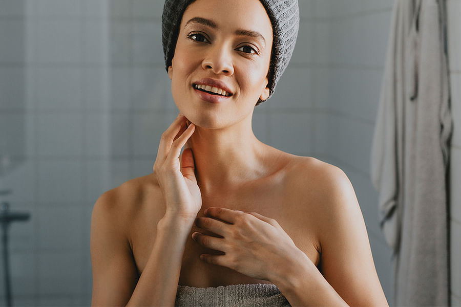 patting skin dry with towel